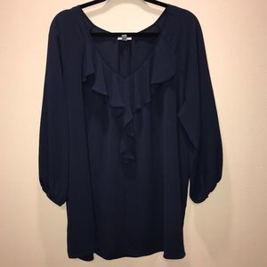 Navy tunic with a ruffle accent